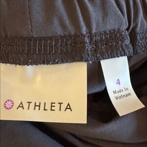 Athleta black one-piece jumsuit with gathered tie waist